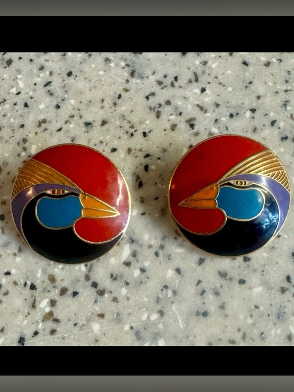Vintage Laurel Burch gold red blue purple orange and black enamel earrings.